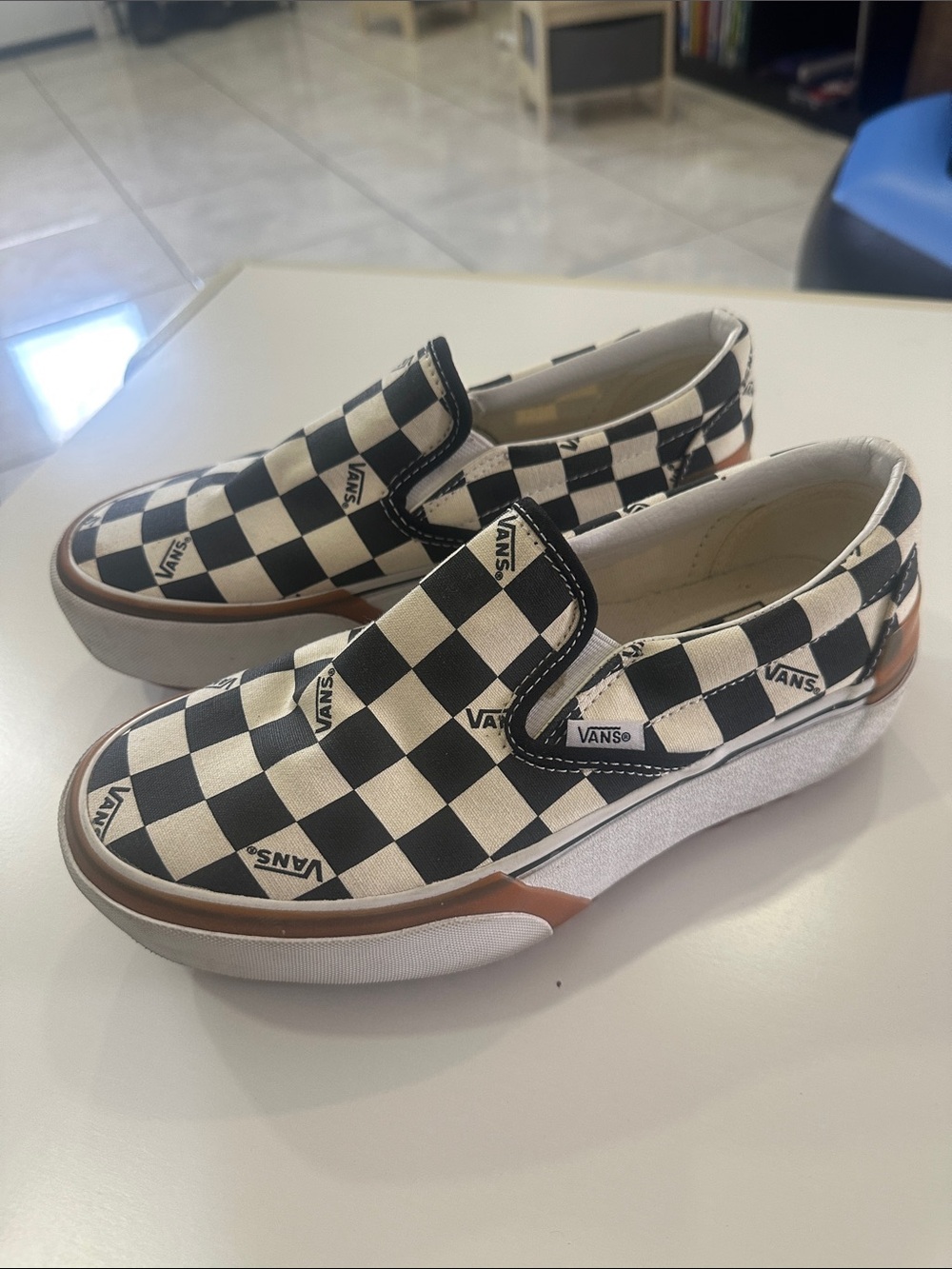 Vans unisex Checkerboard Slip-On Sneakers - Black and White with Brown Trim
